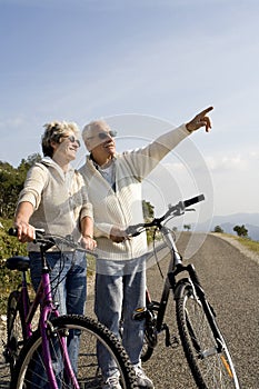 Senior couple cycling