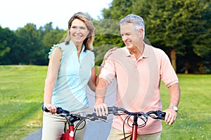 Senior couple cycling