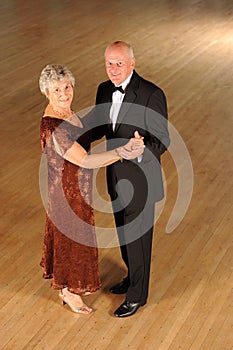 Senior couple in dance pose