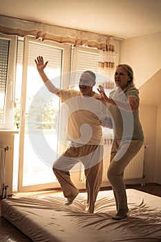 Senior couple dancing.