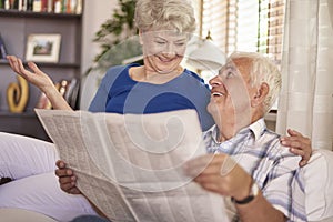 Senior couple discussion about recent news photo