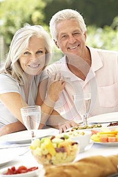 Senior couple enjoying al fresco meal