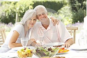 Senior couple enjoying al fresco meal