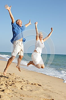 Senior Couple Enjoying Beach Holiday