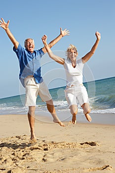 Senior Couple Enjoying Beach Holiday