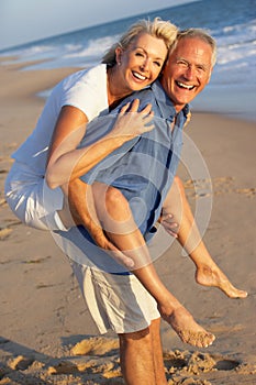 Senior Couple Enjoying Beach Holiday