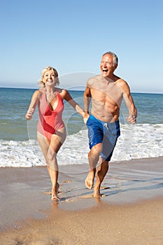 Senior Couple Enjoying Beach Holiday