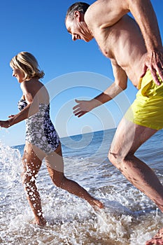 Senior Couple Enjoying Beach Holiday