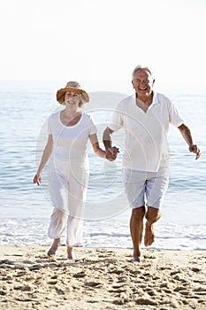 Senior Couple Enjoying Beach Holiday