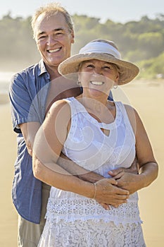 Senior Couple Enjoying Beautiful Sunset on the Beach