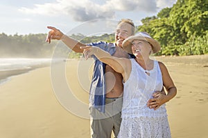 Senior Couple Enjoying Beautiful Sunset on the Beach