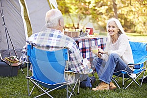 Senior Couple Enjoying Camping Holiday