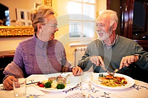 Senior couple enjoying a tasty meal each