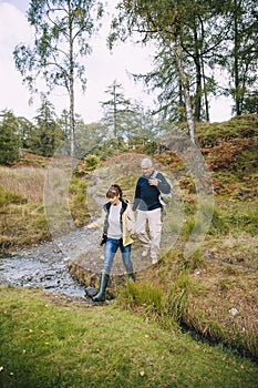 Senior Couple Exploring the Woodlands photo