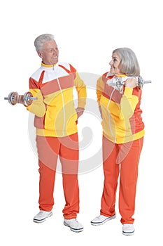 Senior Couple Exercising with dumbbells