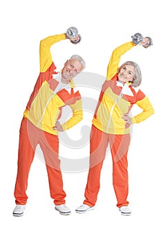 Senior Couple Exercising with dumbbells