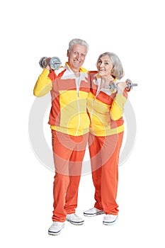 Senior Couple Exercising with dumbbells