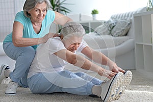 Senior couple exercising in gym