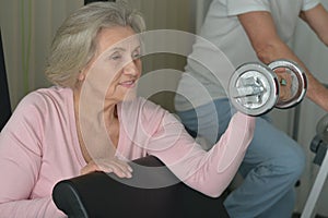 Senior couple exercising in gym