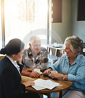 Senior couple, financial advisor and people with paperwork, relax conversation and retirement planning. Insurance