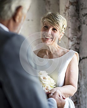 Senior Couple with Flower Bouqet photo