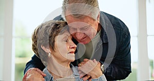Senior couple, forehead kiss and love closeup in a home in retirement and marriage with hug, care and support. Trust