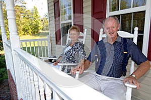 Senior couple on front porch