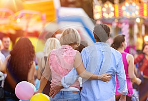 Senior couple at the fun fair