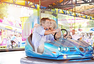 Senior couple at the fun fair