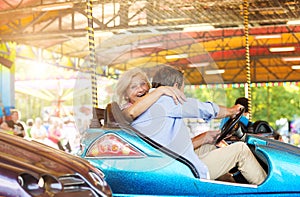 Senior couple at the fun fair
