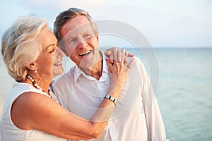 Senior Couple Getting Married In Beach Ceremony