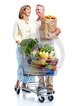 Senior couple with a grocery shopping cart.
