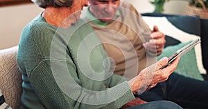 Senior couple, hands and tablet in home for reading news app, social media post or ebook. Closeup of man, woman and