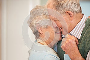 Senior, couple and happy with dancing in home for bonding, support and holding hands with romance. Elderly, man and