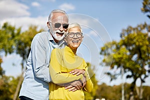 senior couple happy elderly love together cheerful smiling portrait holding hands woman retirement man