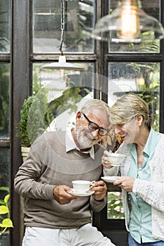 Senior couple having an afternoon tea