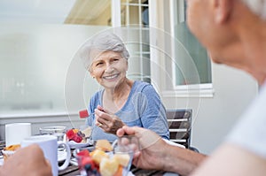 Senior couple having breakfast