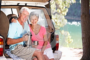 Senior couple having country picnic