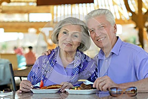 Senior couple having lunch