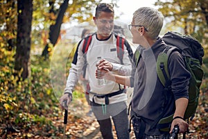 Senior couple hiking; Active retirment concept