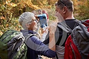 Senior couple hiking; Active retirment concept