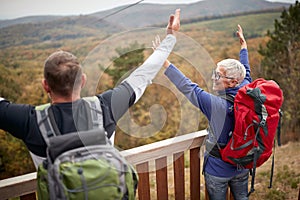 Senior couple hiking; Active retirment concept