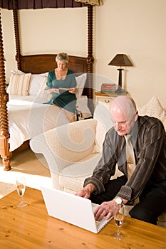 Senior couple in hotel room