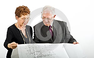 Senior couple and house plans