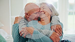 Senior couple, hug and love in bedroom, care and conversation together at home. Embrace, elderly man and happy woman in