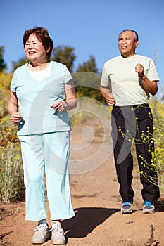 Senior couple jogging