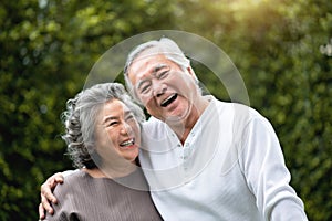 Senior Couple laughing at the park
