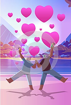 senior couple in love dancing on summer beach old man woman lovers having fun active old age happy valentines day