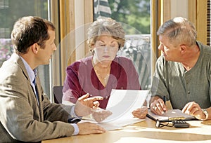 Senior couple meeting with agent