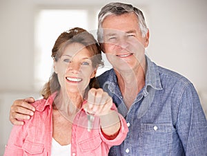 Senior couple moving into new home